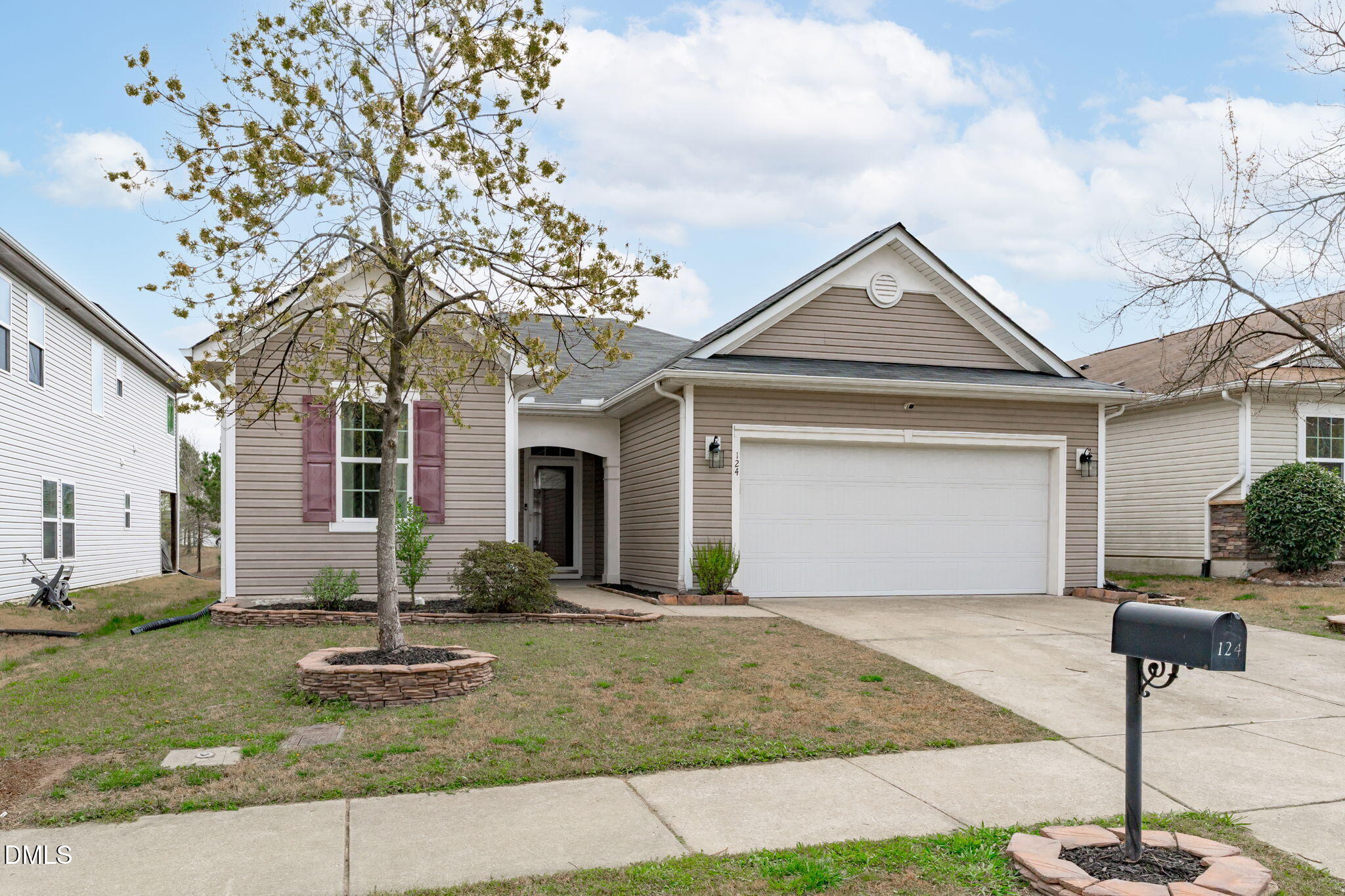 124 Daneborg Road Durham, NC 27703 - Photo 39 of 40 a front view of a house with garden