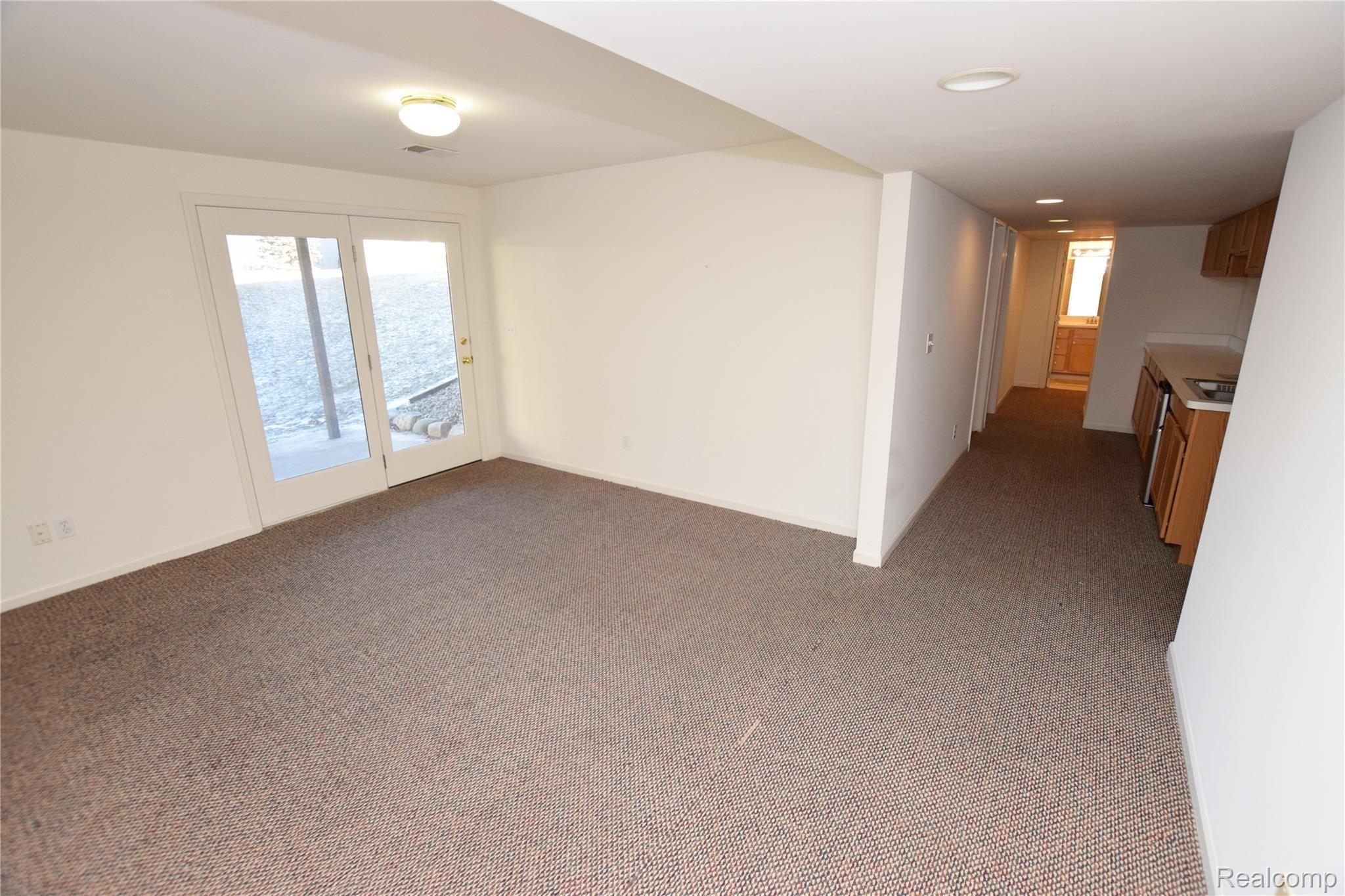 9524 Timber Ridge Drive Grand Blanc, MI 48439 - Photo 10 of 17 Lower Level with Walk-out