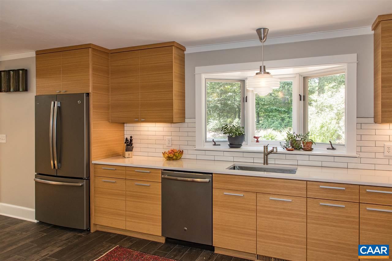 2227 Miller Lake Road Afton, VA 22920 - Photo 12 of 45 a kitchen with stainless steel appliances granite countertop a refrigerator and a sink