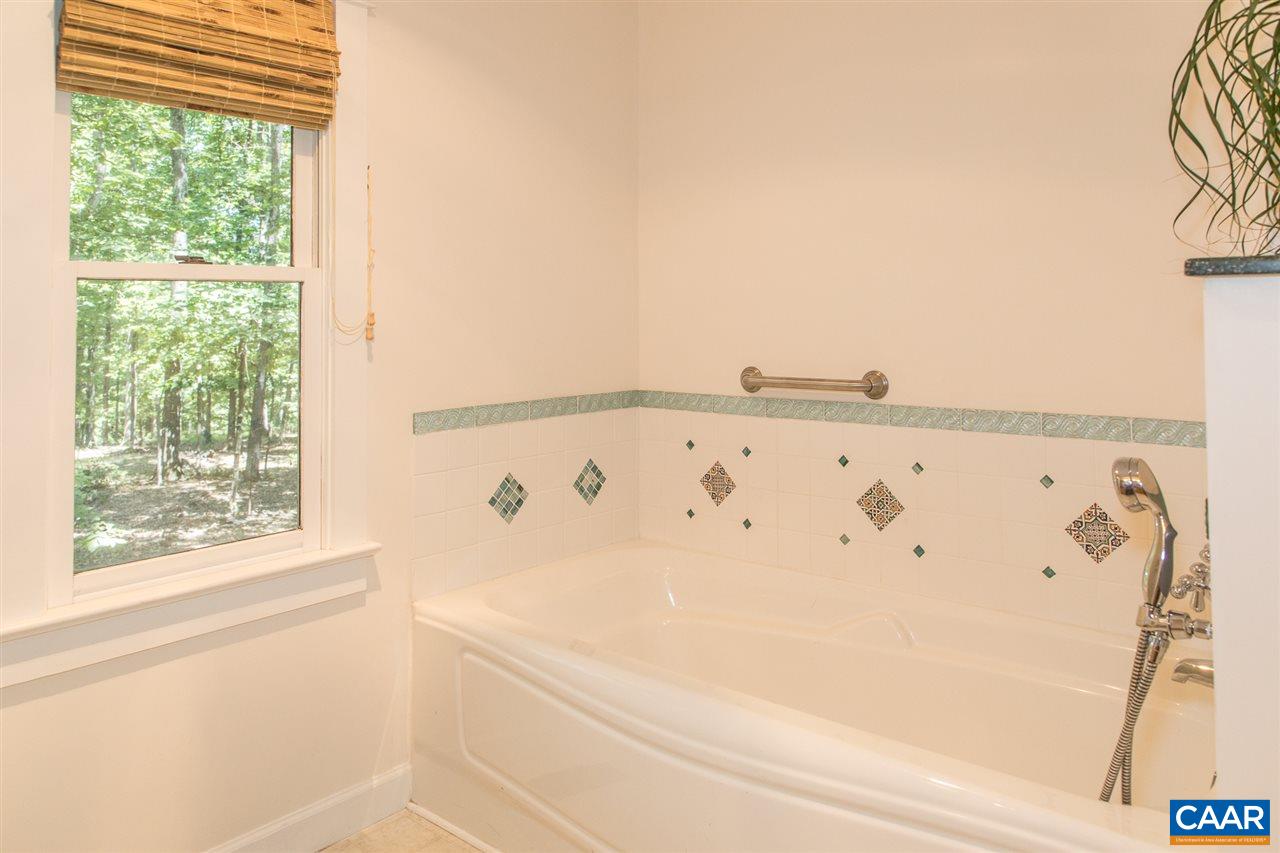 2227 Miller Lake Road Afton, VA 22920 - Photo 28 of 45 a close up of a white wall with a window