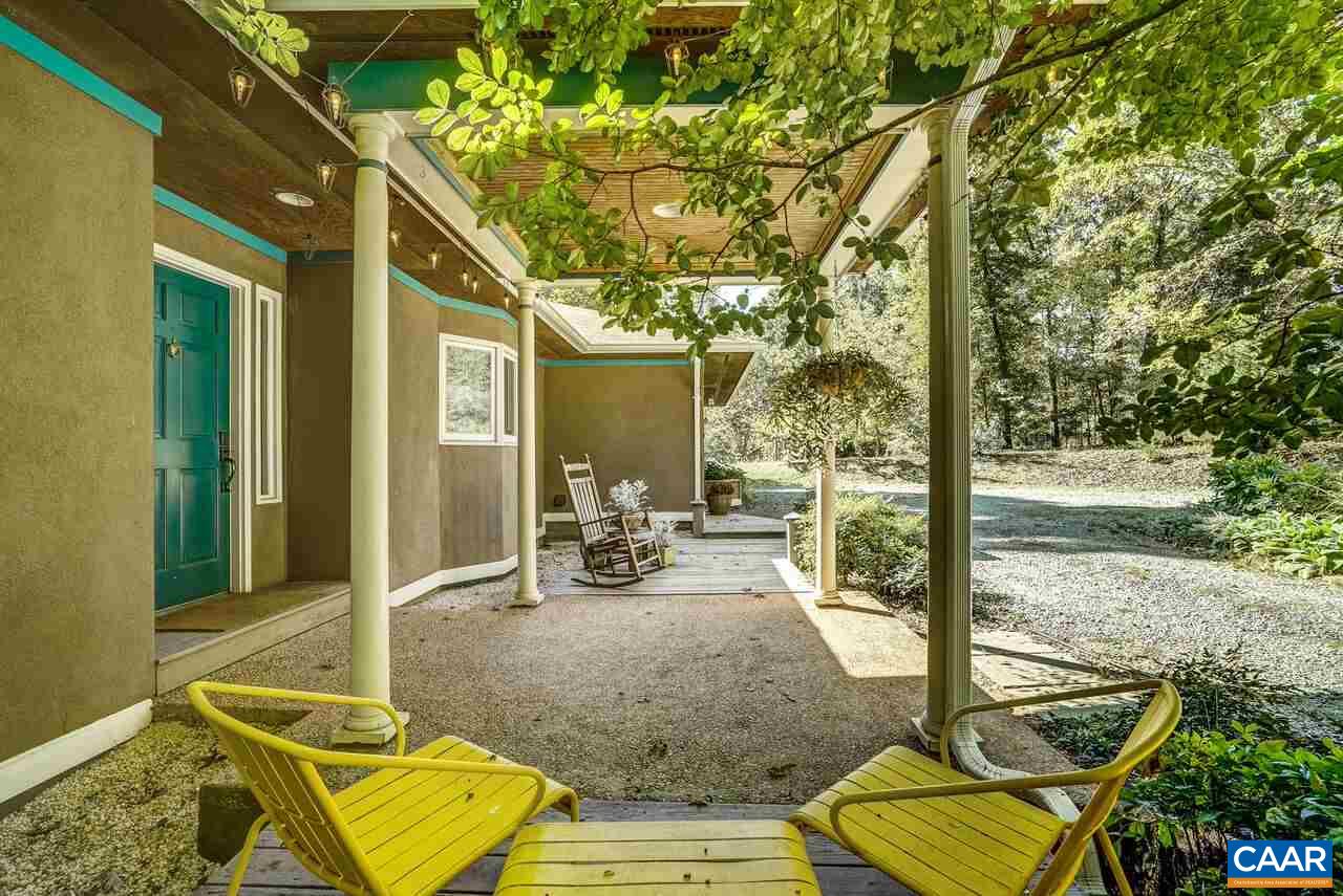 2227 Miller Lake Road Afton, VA 22920 - Photo 3 of 45 a view of a patio with table and chairs and potted plants