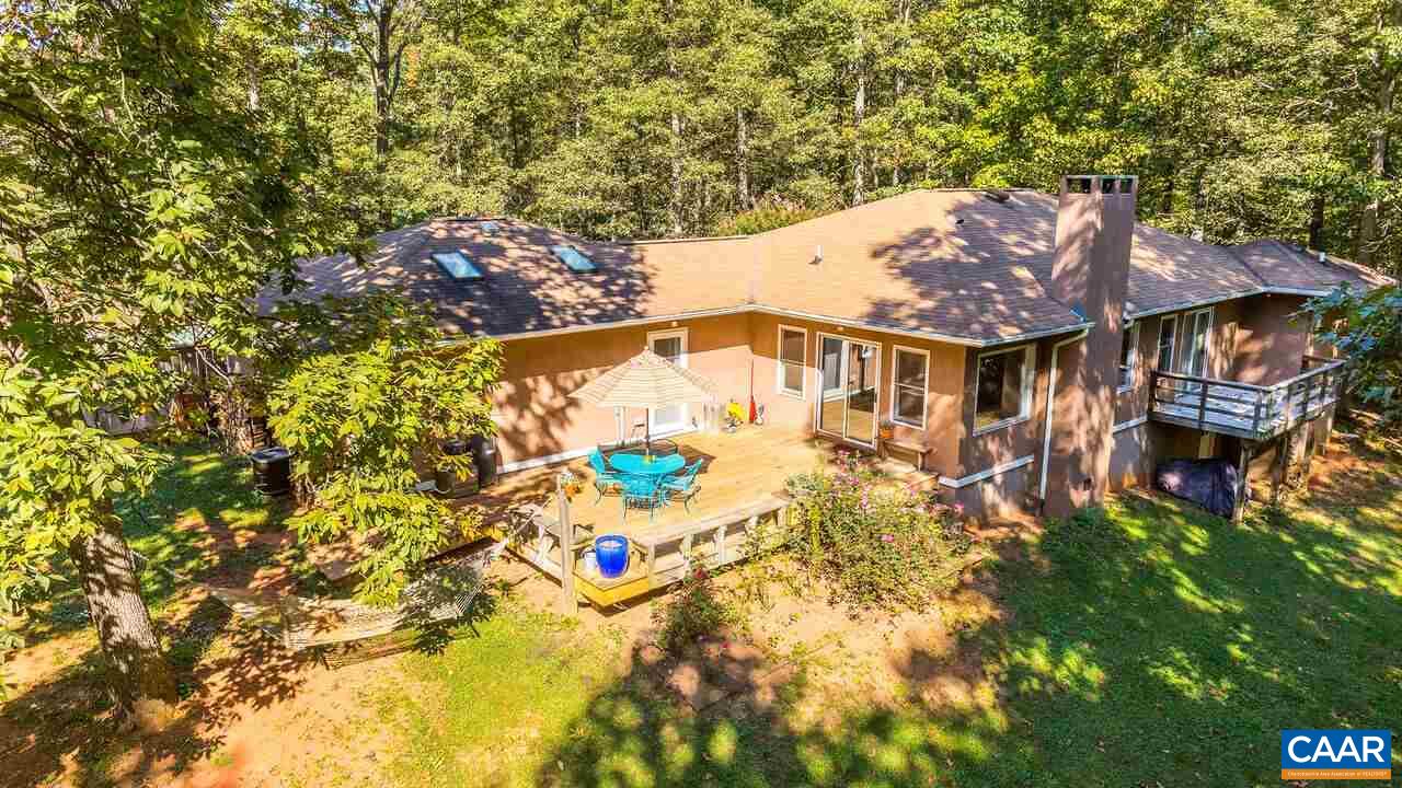 2227 Miller Lake Road Afton, VA 22920 - Photo 34 of 45 a view of a house with a yard and garden