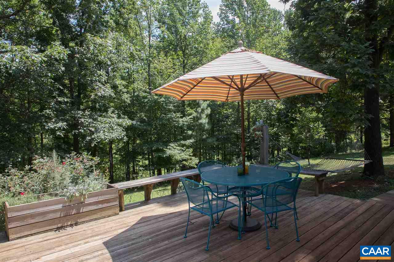 2227 Miller Lake Road Afton, VA 22920 - Photo 44 of 45 an outdoor space with furniture and umbrella