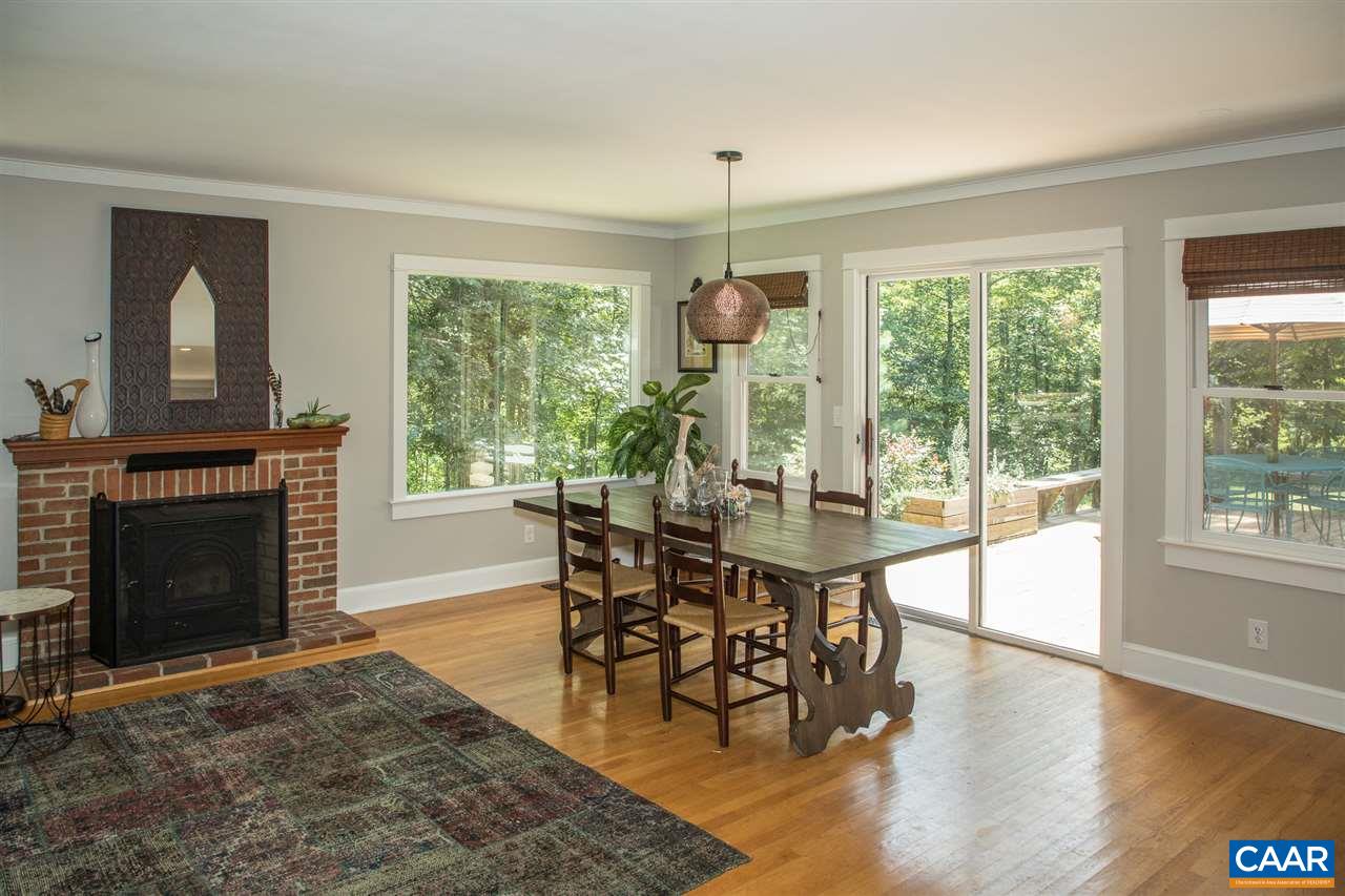 2227 Miller Lake Road Afton, VA 22920 - Photo 7 of 45 a view of a dining room with furniture window and wooden floor