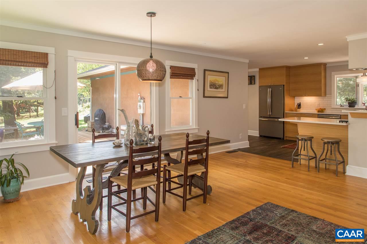 2227 Miller Lake Road Afton, VA 22920 - Photo 8 of 45 a view of a dining room with furniture window and wooden floor