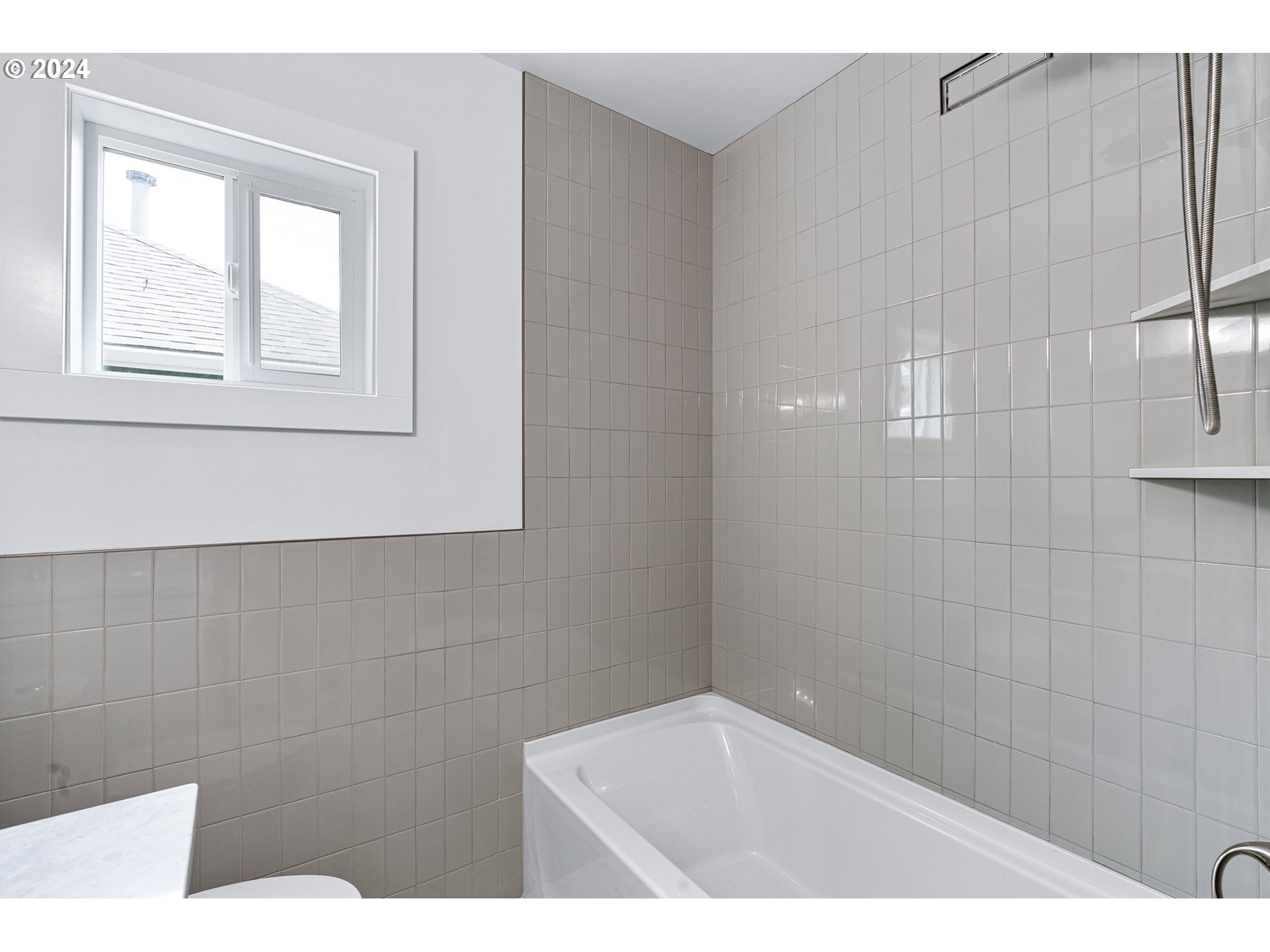 9045 Southeast Morrison Street Portland, OR 97216 - Photo 18 of 35 a bathroom with a toilet