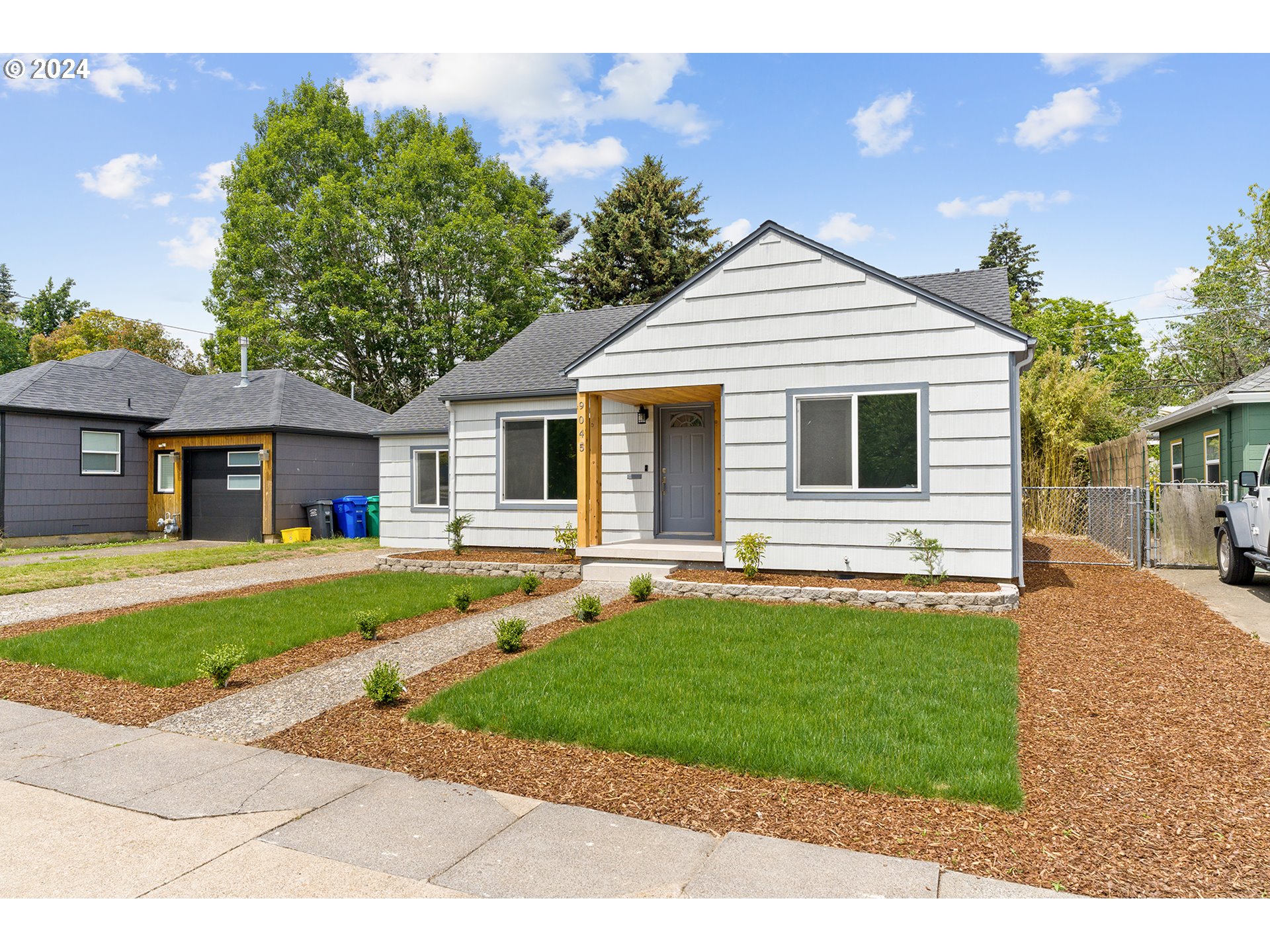 9045 Southeast Morrison Street Portland, OR 97216 - Photo 2 of 35 a view of a yard in front of house
