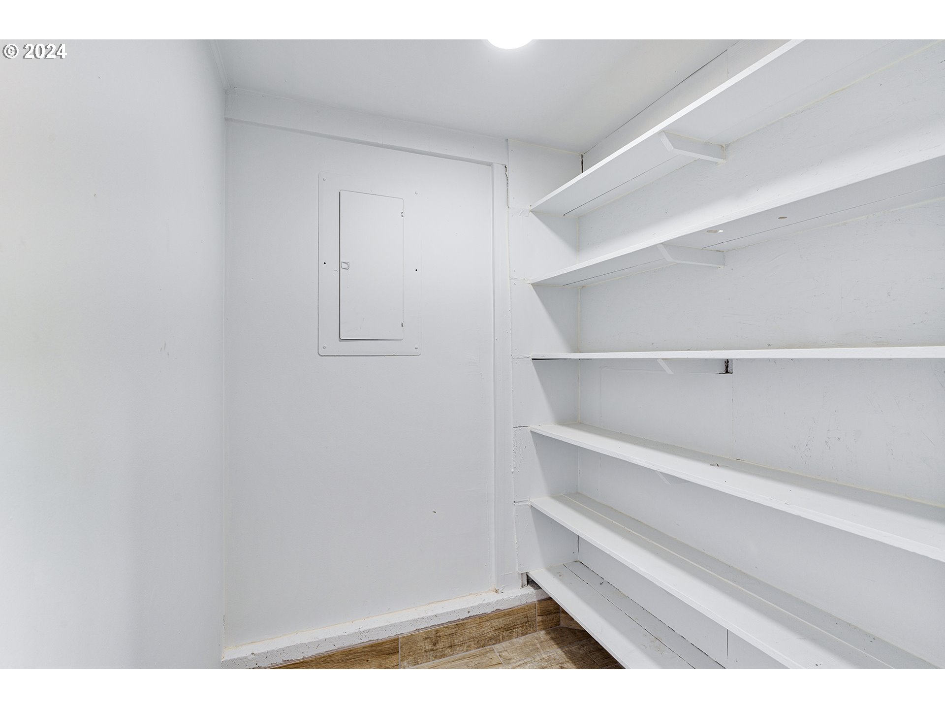 9045 Southeast Morrison Street Portland, OR 97216 - Photo 27 of 35 a view of small space with racks on the wall