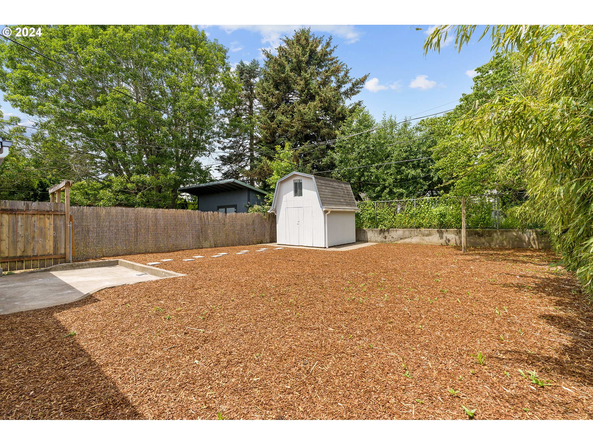 9045 Southeast Morrison Street Portland, OR 97216 - Photo 30 of 35 a backyard of a house