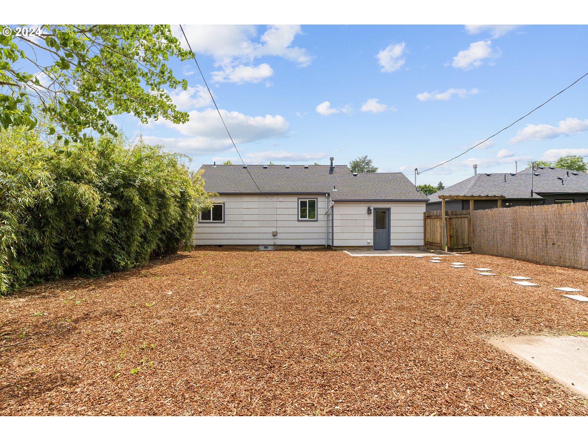 9045 Southeast Morrison Street Portland, OR 97216 - Photo 32 of 35 a house with a outdoor space