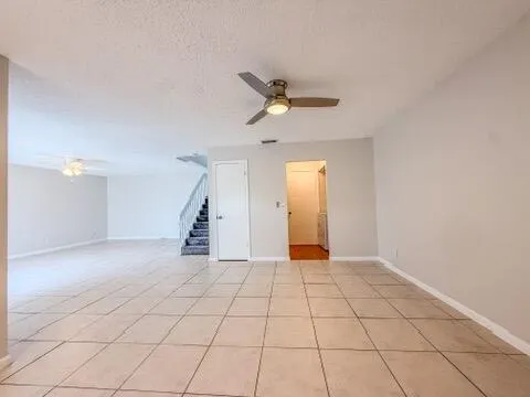 a view of a storage & utility room with a washer dryer