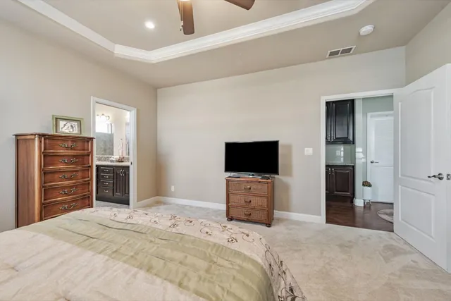 a bedroom with a bed and furniture