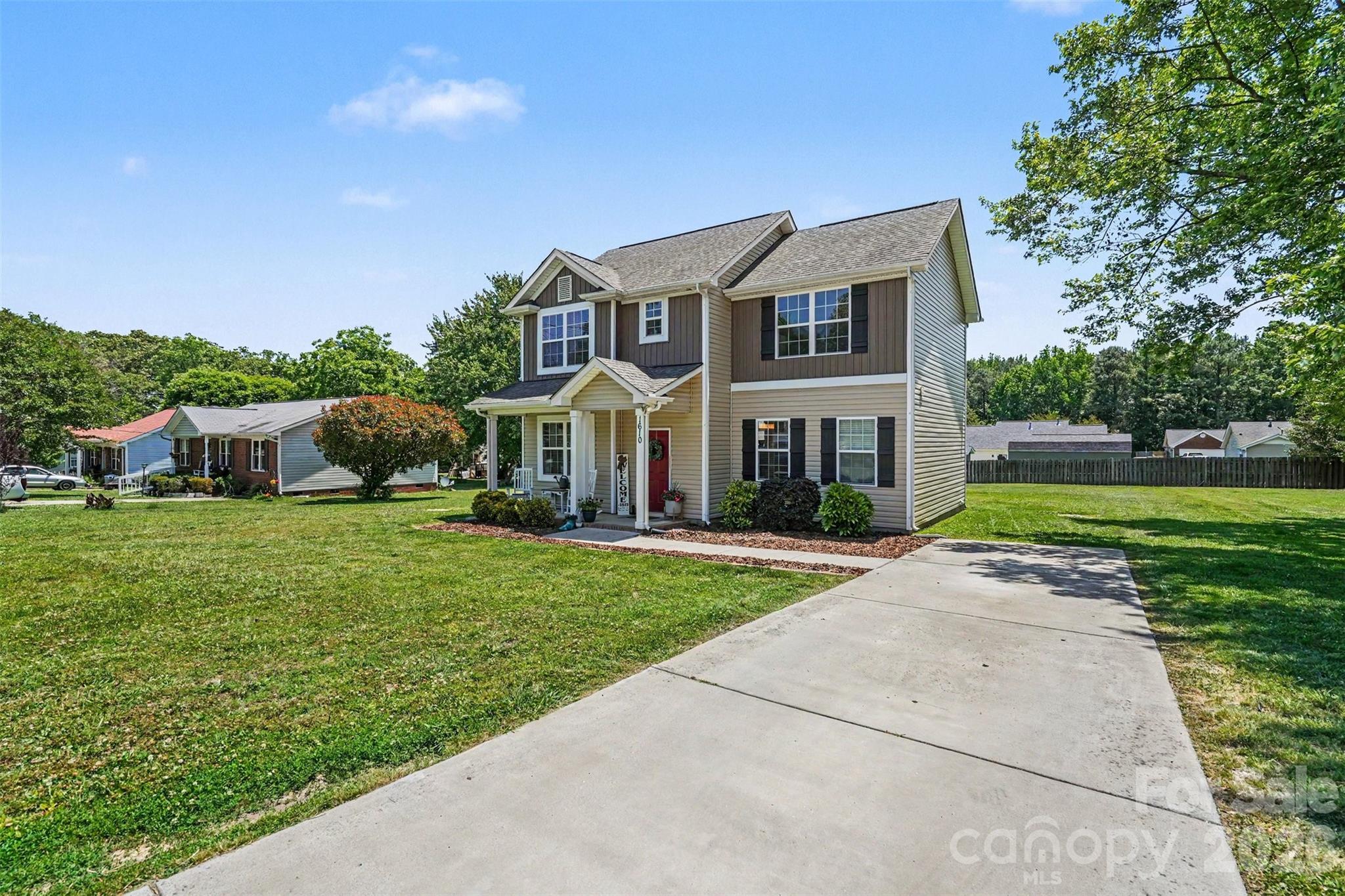 1610 Walter Hasty Road Monroe, NC 28110 - Photo 2 of 32 a front view of house with yard and green space