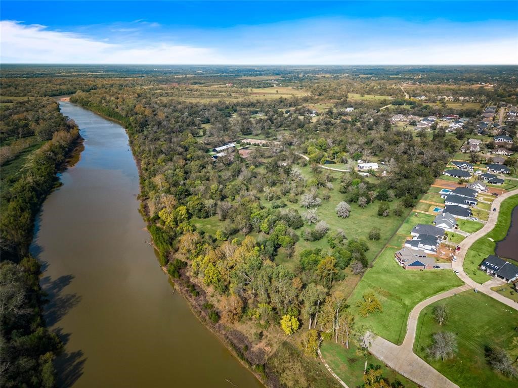 2990 Bowser Road Fulshear, TX 77441 - Photo 6 of 9 an aerial view of residential houses with outdoor space