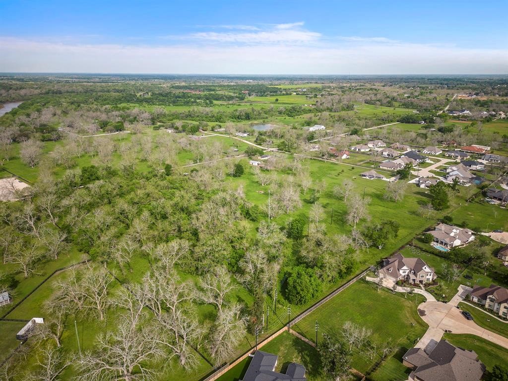2990 Bowser Road Fulshear, TX 77441 - Photo 7 of 9 a view of a field with an ocean