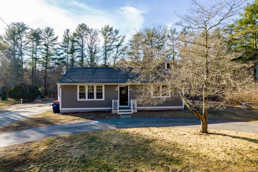 213 Walnut Plain Road Rochester, MA 02770 - Photo 31 of 38 a view of a house with a yard