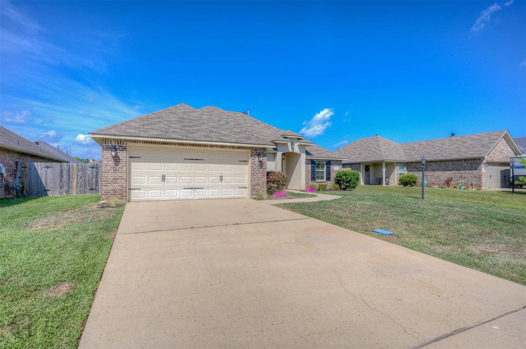 233 Sedgewick Avenue Haughton, LA 71037 - Photo 16 of 19 a front view of a house with a yard