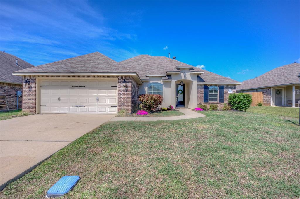 233 Sedgewick Avenue Haughton, LA 71037 - Photo 17 of 19 a front view of a house with yard