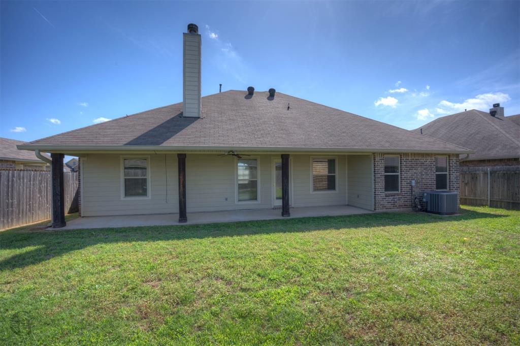 233 Sedgewick Avenue Haughton, LA 71037 - Photo 19 of 19 a front view of a house with a yard and garage