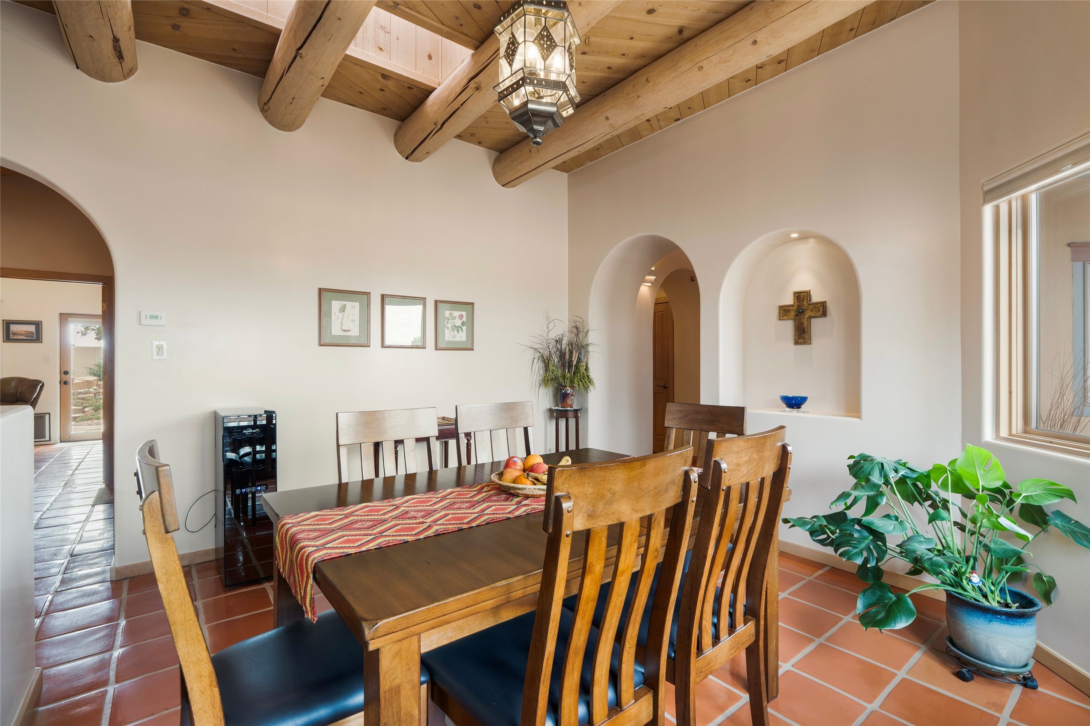 23 Descanso Road Santa Fe, NM 87508 - Photo 11 of 54 Dining room with arched doorways and nicho