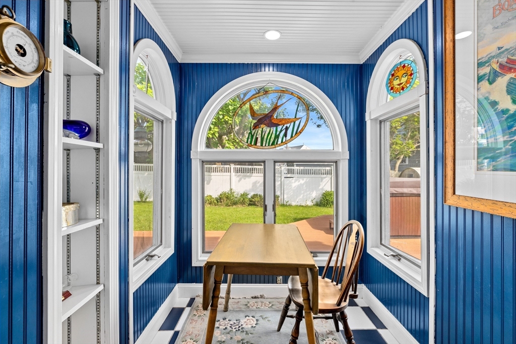79 Kenneth Road Scituate, MA 02066 - Photo 14 of 39 a view of a dining room with furniture a chandelier and wooden floor