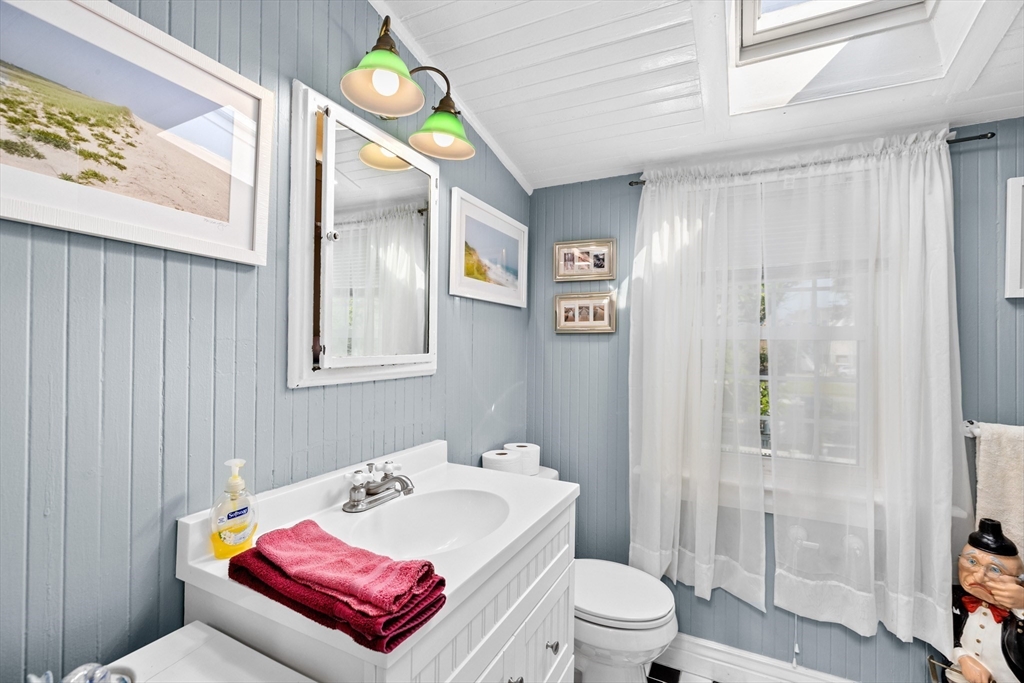 79 Kenneth Road Scituate, MA 02066 - Photo 21 of 39 a bathroom with a sink toilet and shower