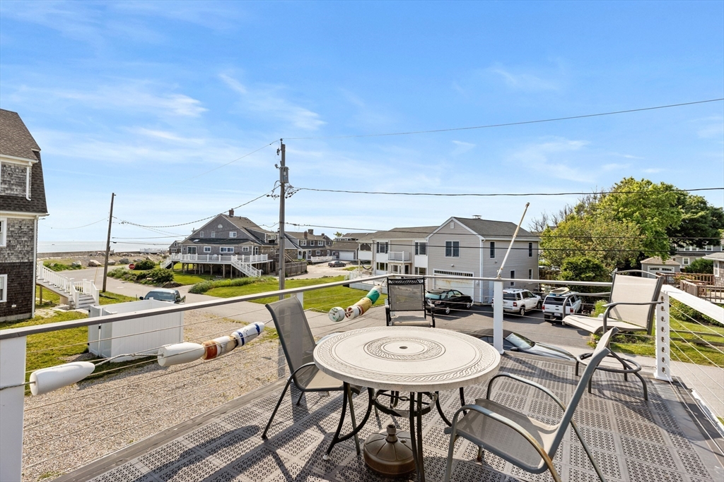 79 Kenneth Road Scituate, MA 02066 - Photo 31 of 39 a view of a terrace with furniture and stove