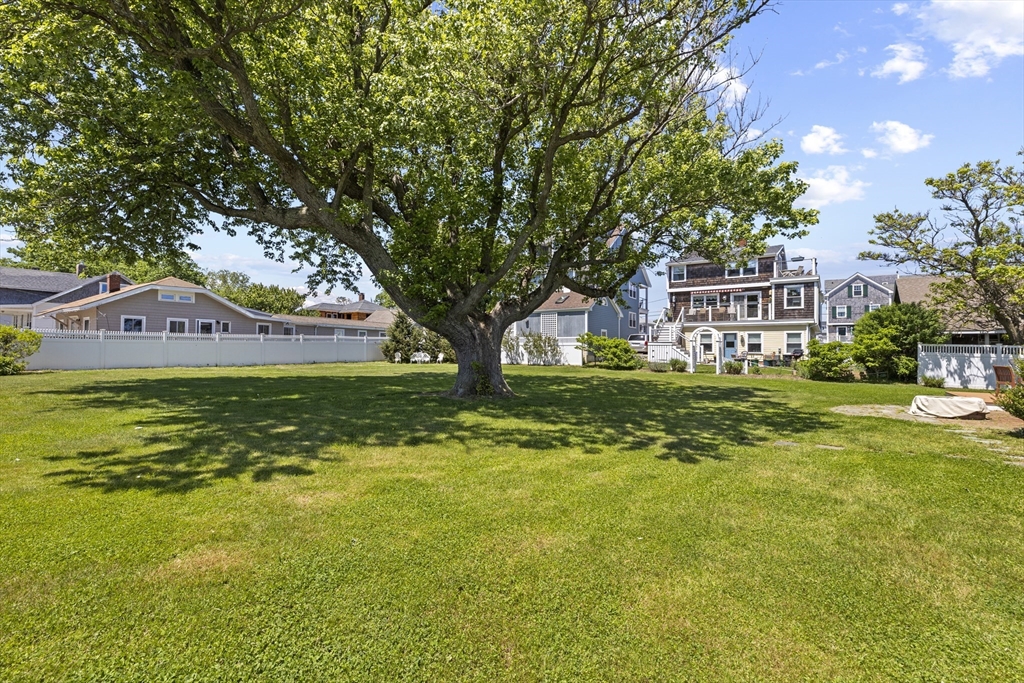 79 Kenneth Road Scituate, MA 02066 - Photo 34 of 39 a view of a house with garden and trees