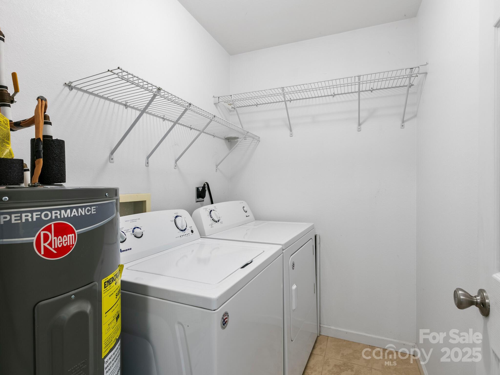 186 Wiggins Road Candler, NC 28715 - Photo 28 of 32 a utility room with dryer and washer