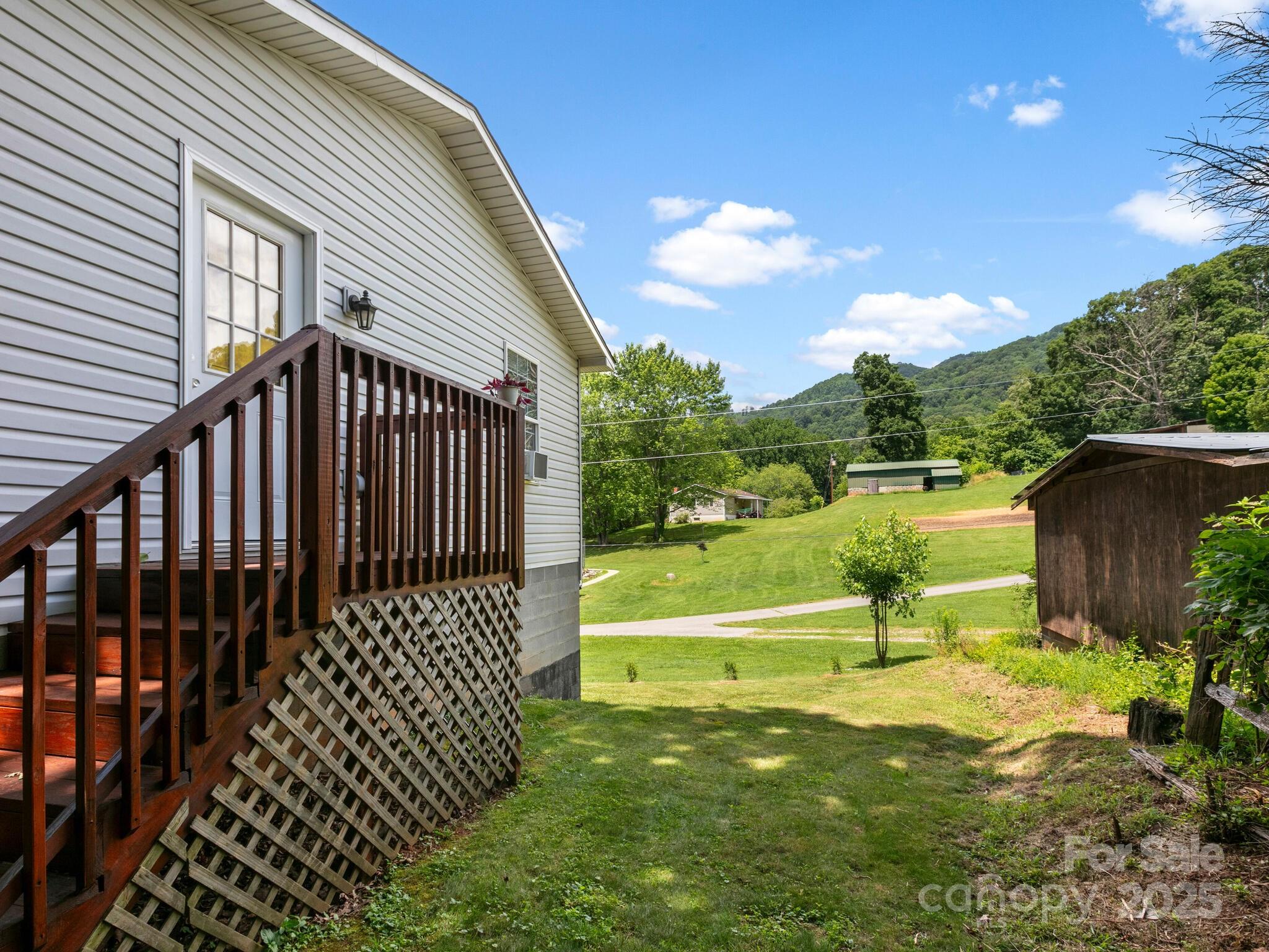 186 Wiggins Road Candler, NC 28715 - Photo 31 of 32 a view of a backyard