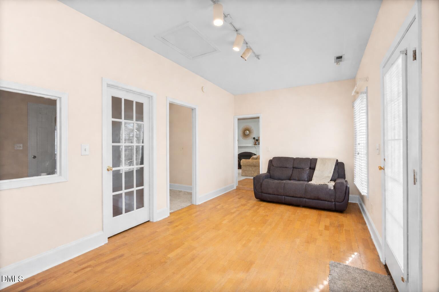2109 Star Sapphire Drive Raleigh, NC 27610 - Photo 19 of 37 a living room with furniture and a rug