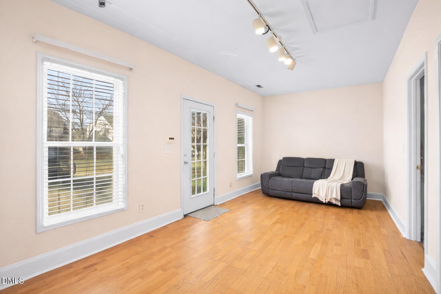 2109 Star Sapphire Drive Raleigh, NC 27610 - Photo 20 of 37 a living room with furniture and a window