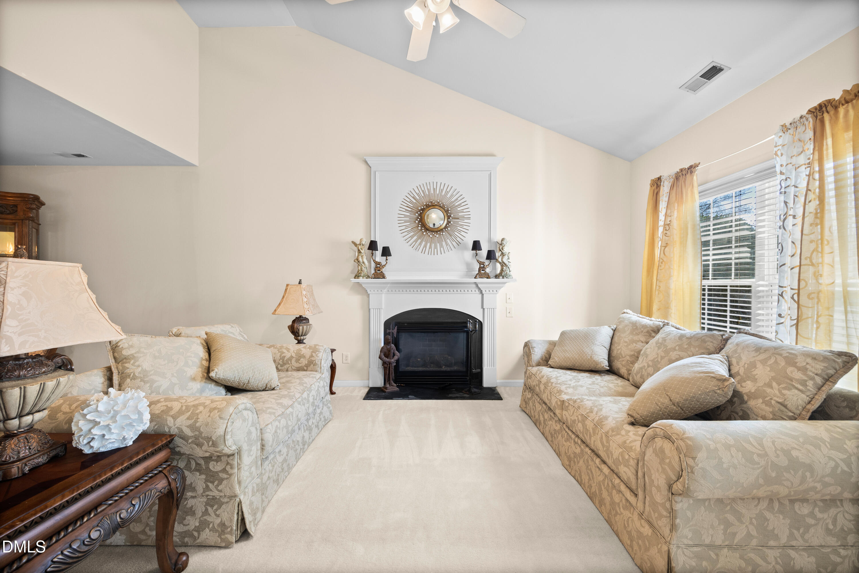 2109 Star Sapphire Drive Raleigh, NC 27610 - Photo 5 of 37 a bedroom with furniture and a fireplace