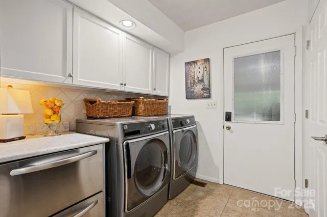 a utility room with dryer and washer