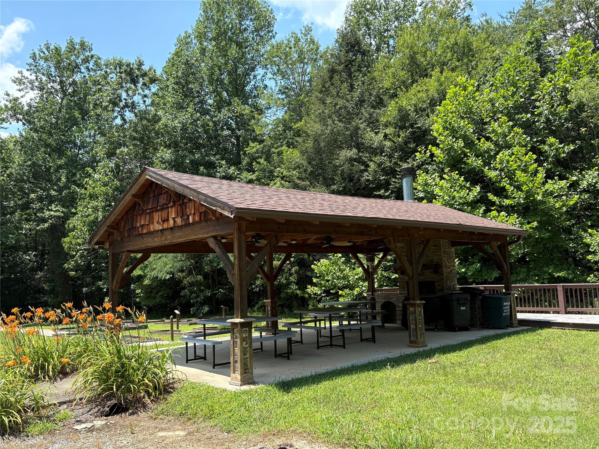 Lot 13 Wild Flower Way Marion, NC 28752 - Photo 13 of 16 a view of a chair and table of the garden