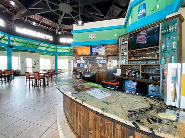 a view of a swimming pool with chairs