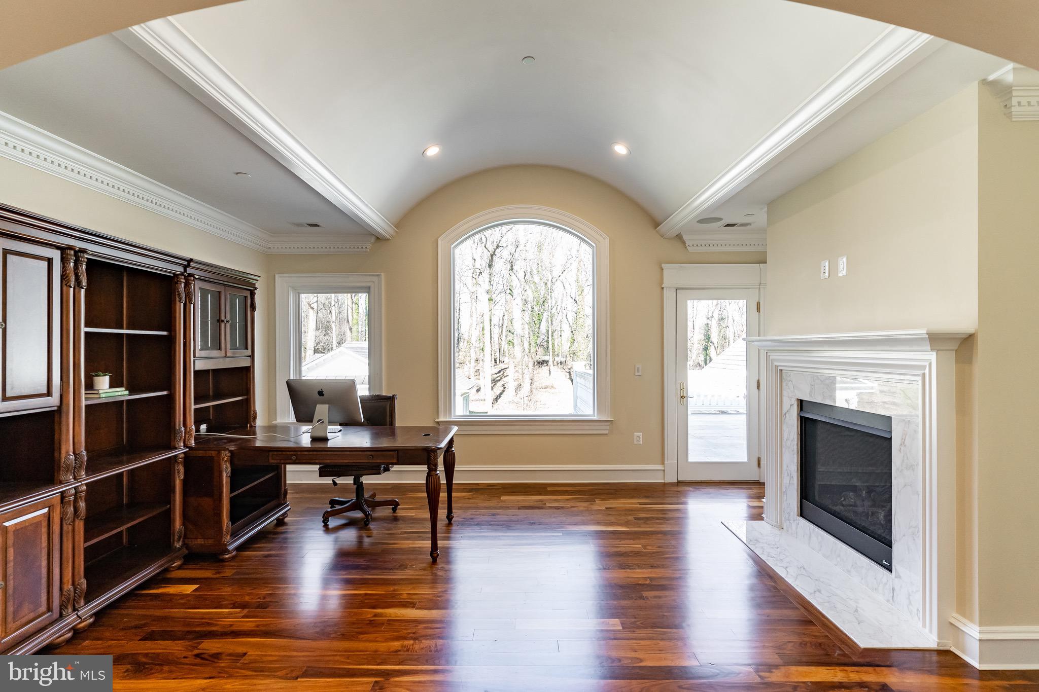 10110 Chapel Road Potomac, MD 20854 - Photo 16 of 28 a living room with furniture and a fireplace