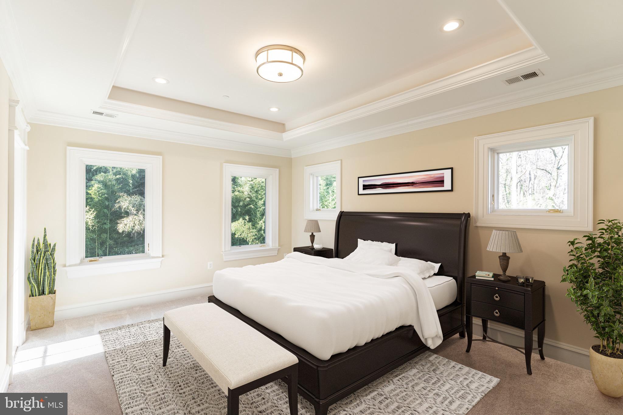 10110 Chapel Road Potomac, MD 20854 - Photo 21 of 28 a bedroom with a large bed and a window