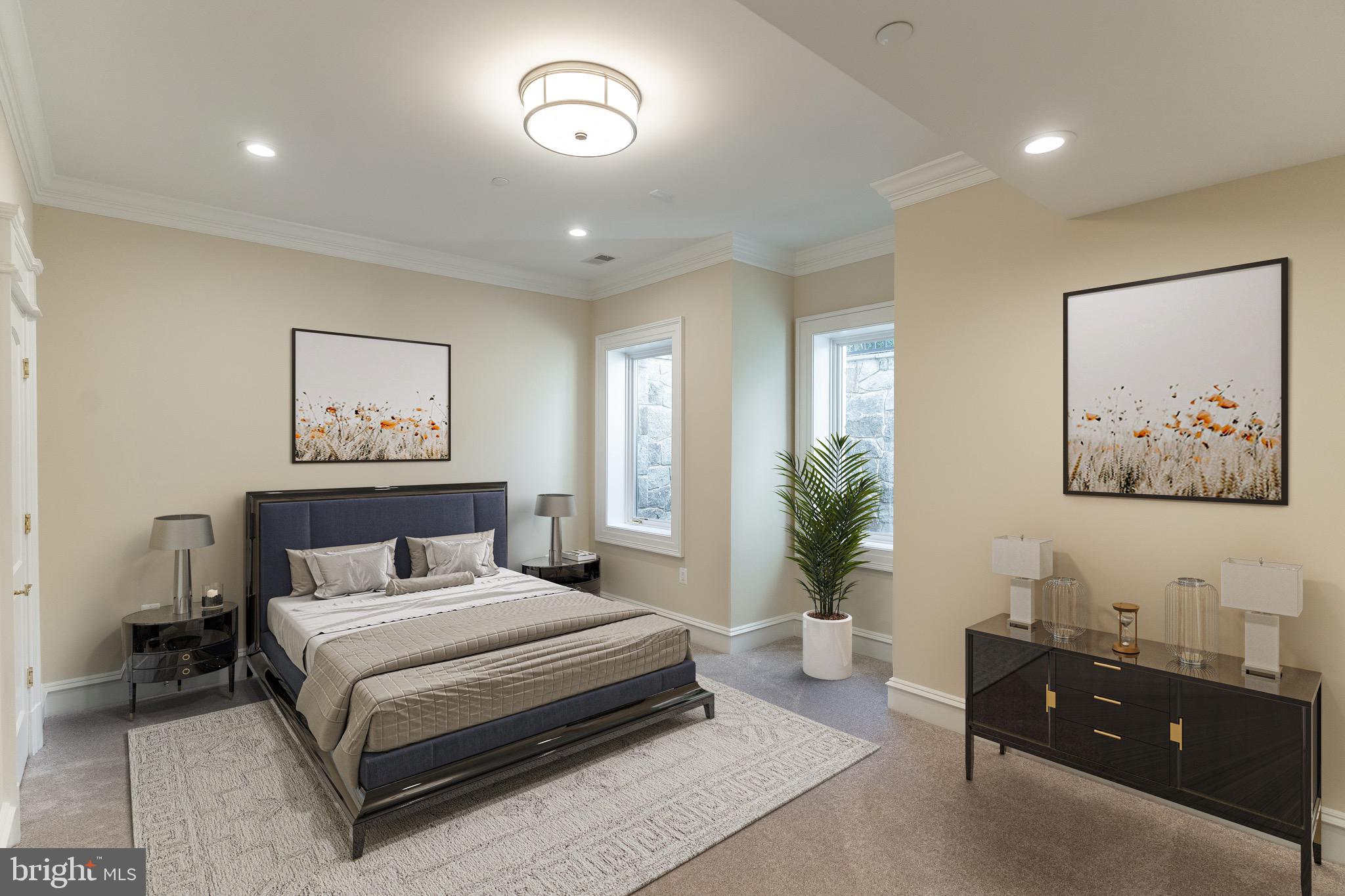 10110 Chapel Road Potomac, MD 20854 - Photo 22 of 28 a bedroom with a large bed and a painting on the wall