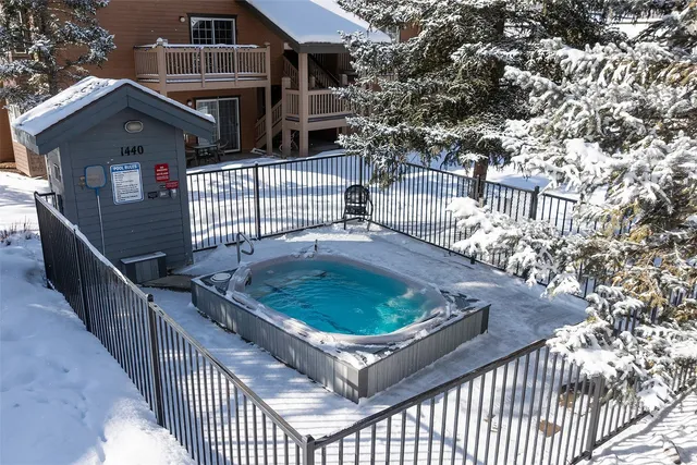 a balcony with lots of trees