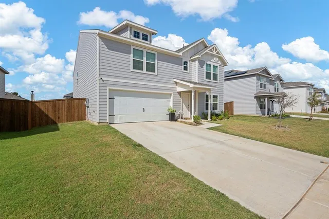 a front view of house with yard
