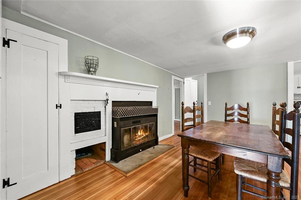4 Ironworks Hill Road Brookfield, CT 06804 - Photo 15 of 34 Dining room with Fireplace