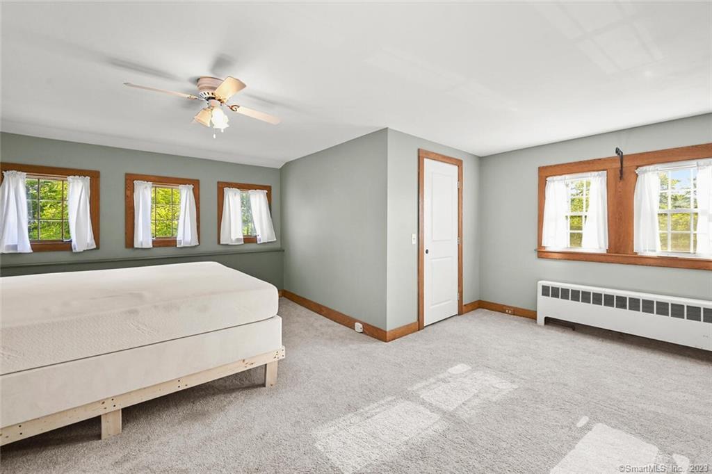 4 Ironworks Hill Road Brookfield, CT 06804 - Photo 21 of 34 Primary Bedroom - a sunny sanctuary