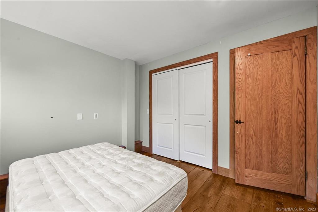 4 Ironworks Hill Road Brookfield, CT 06804 - Photo 25 of 34 Bedroom #1 Ample Closet Space, antique hardwood floors