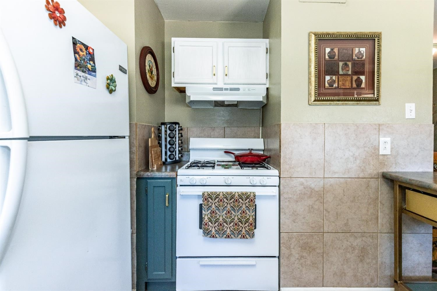 2820 62nd Street Lubbock, TX 79413 - Photo 20 of 43 a kitchen with refrigerator and cabinets