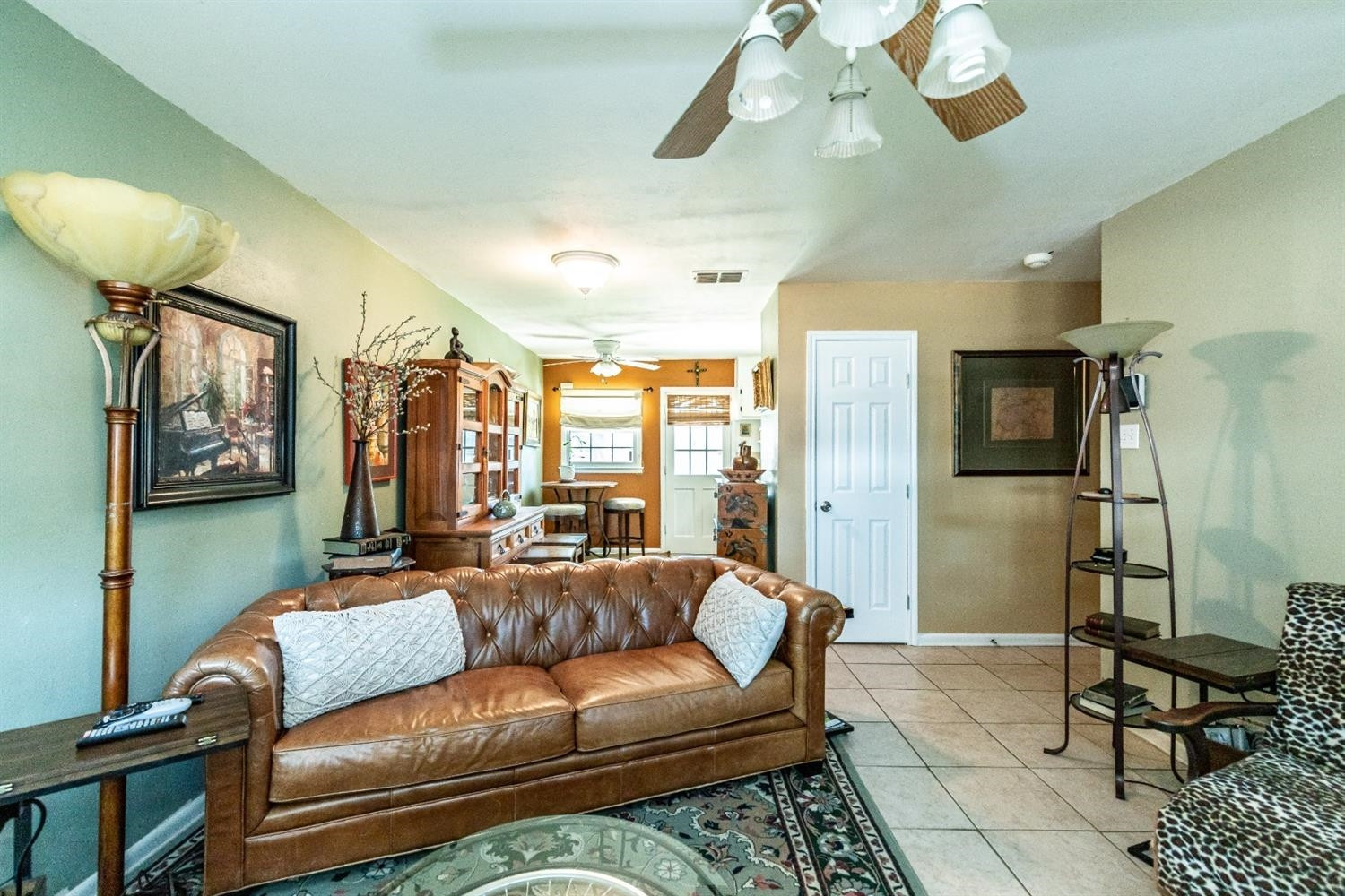 2820 62nd Street Lubbock, TX 79413 - Photo 2 of 43 a living room with furniture wooden floor and a chandelier