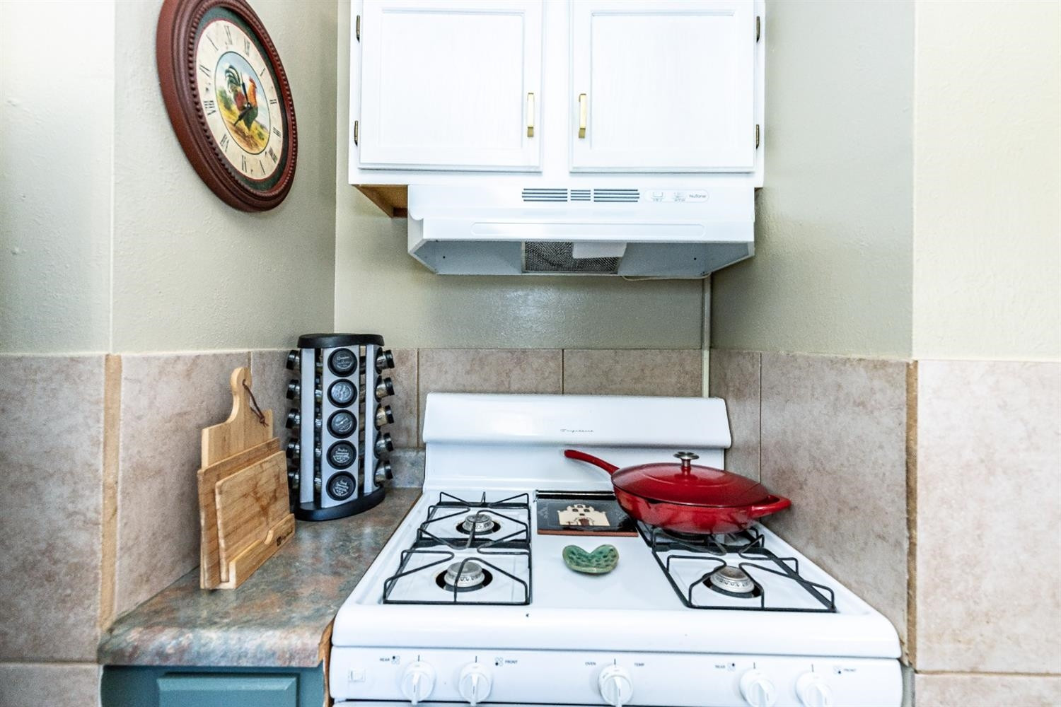 2820 62nd Street Lubbock, TX 79413 - Photo 21 of 43 a white stove top oven sitting inside of a kitchen