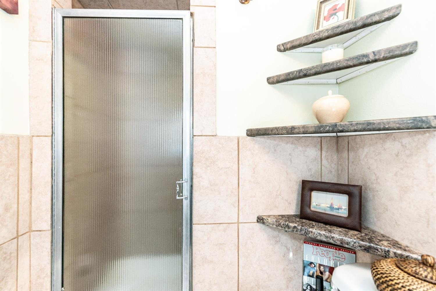 2820 62nd Street Lubbock, TX 79413 - Photo 28 of 43 a bathroom with a shower and a toilet