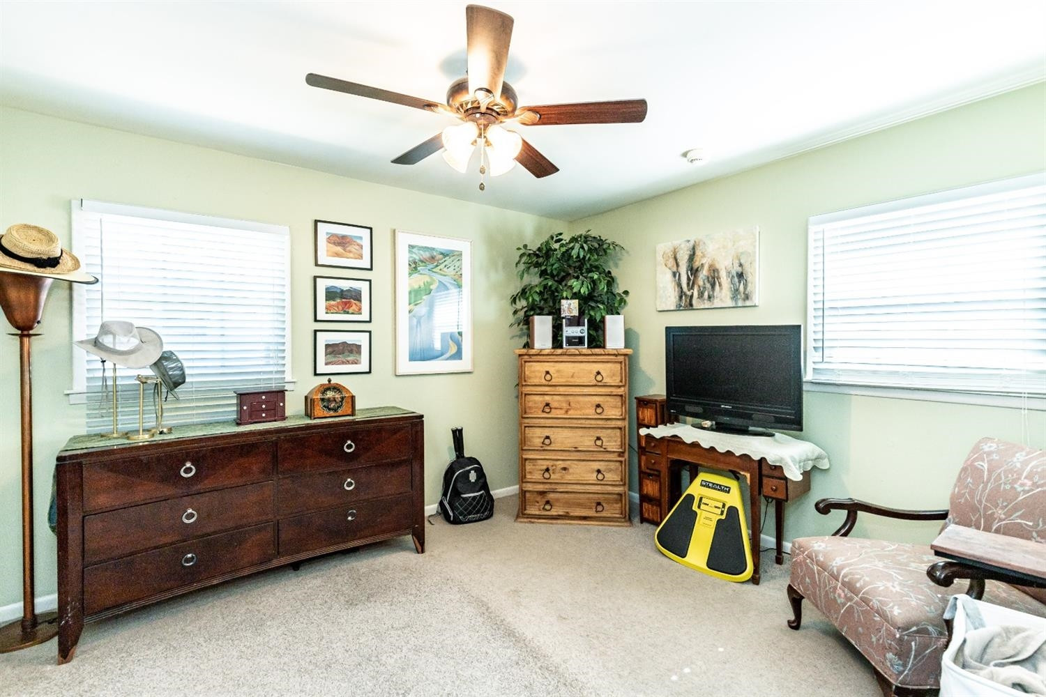 2820 62nd Street Lubbock, TX 79413 - Photo 29 of 43 a room with furniture and a flat screen tv