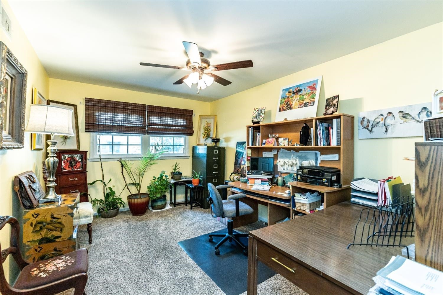 2820 62nd Street Lubbock, TX 79413 - Photo 33 of 43 a living room with furniture a ceiling fan and a window